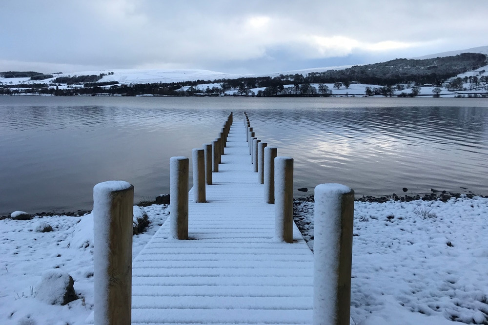 snow on hotel jetty