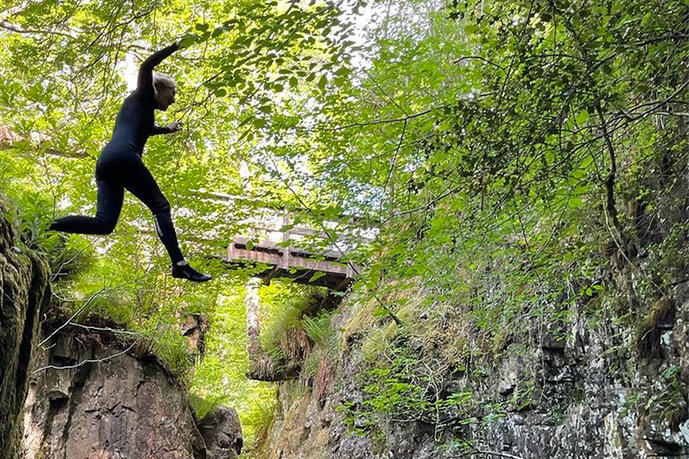 Jo jumping into water