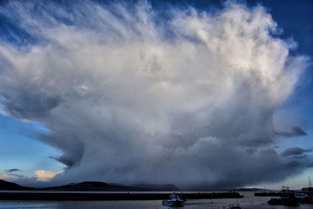 A storm system spotted from the Cobb Lyme regis Dorset uk Catherine Alexander