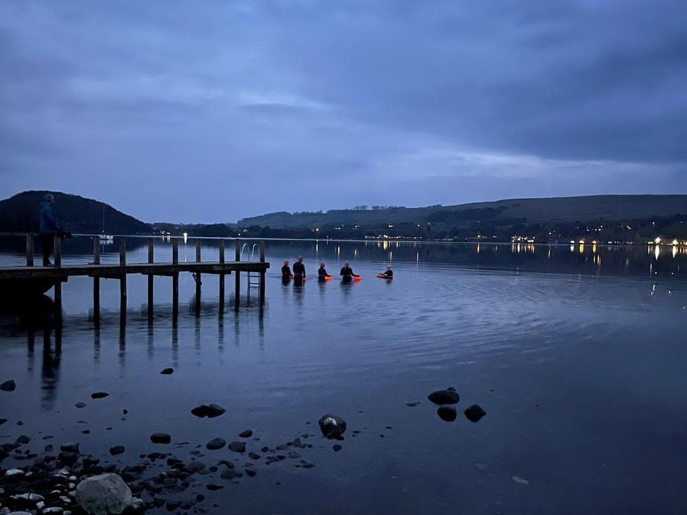 Image of night sea swimmers