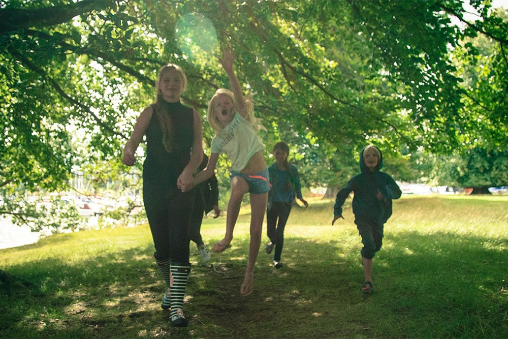 Children running in the garden