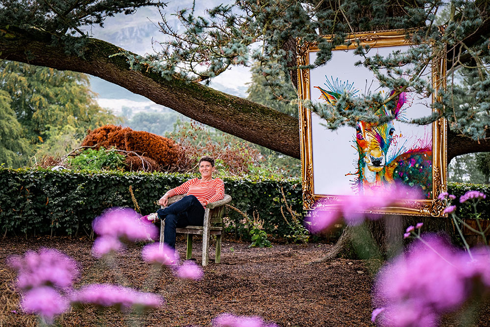 Image of Sarah Taylor and a artwork of a deer