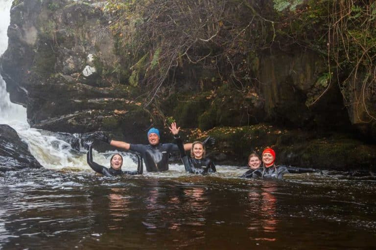 Team waterfall swim