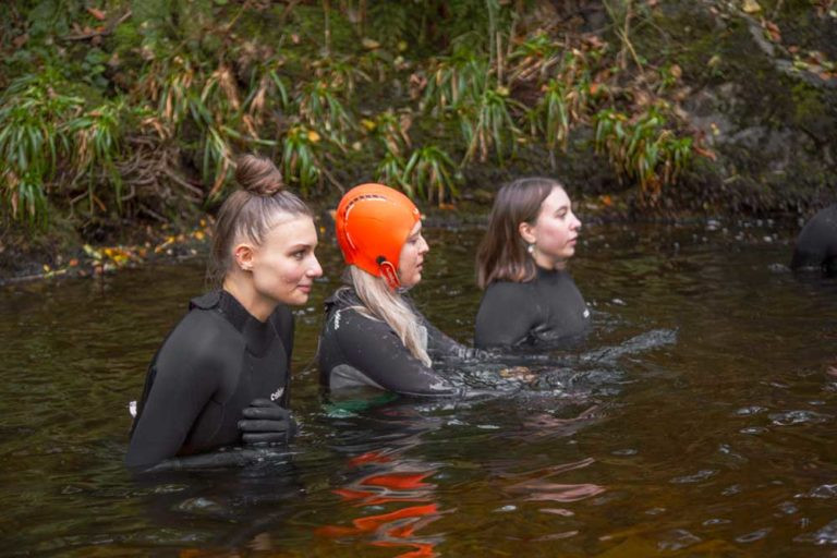Swimming in a waterfall