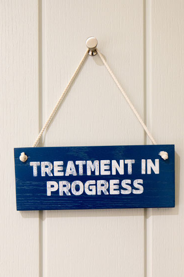 swim club treatment room sign