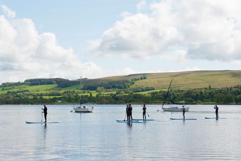 Stand up paddleboarding on the lake