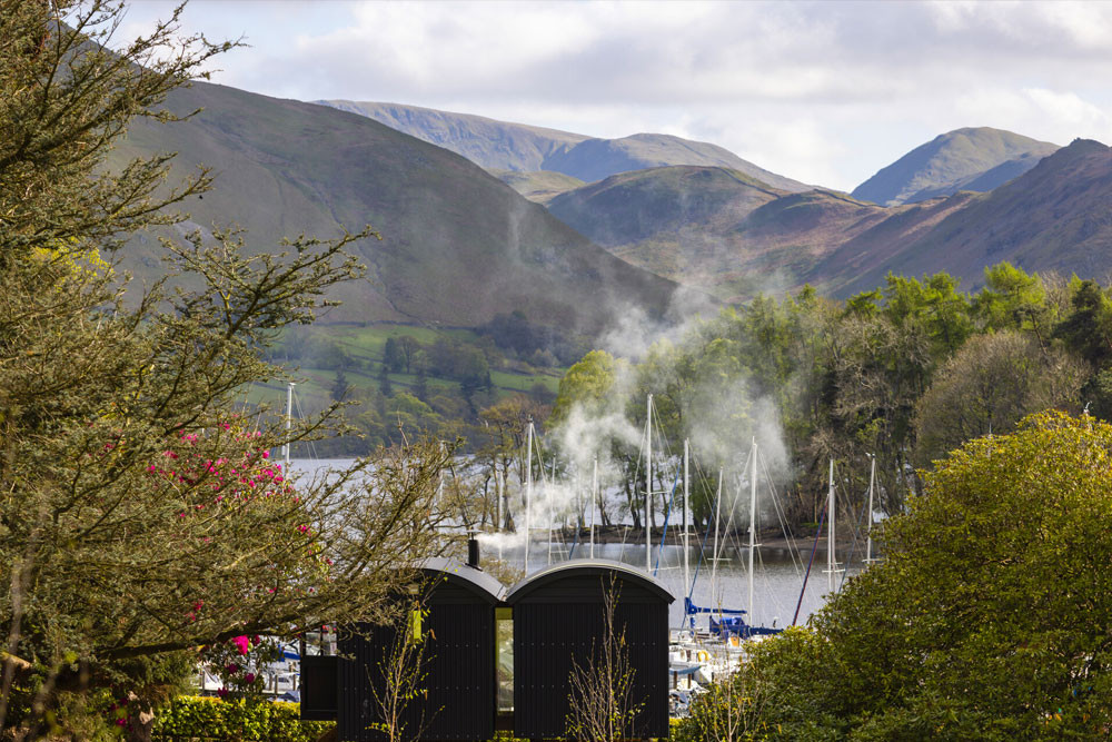 couple shepherd hut view